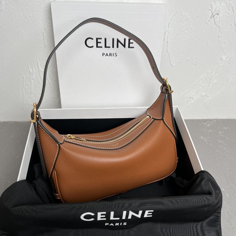 Ce**e top handle bags